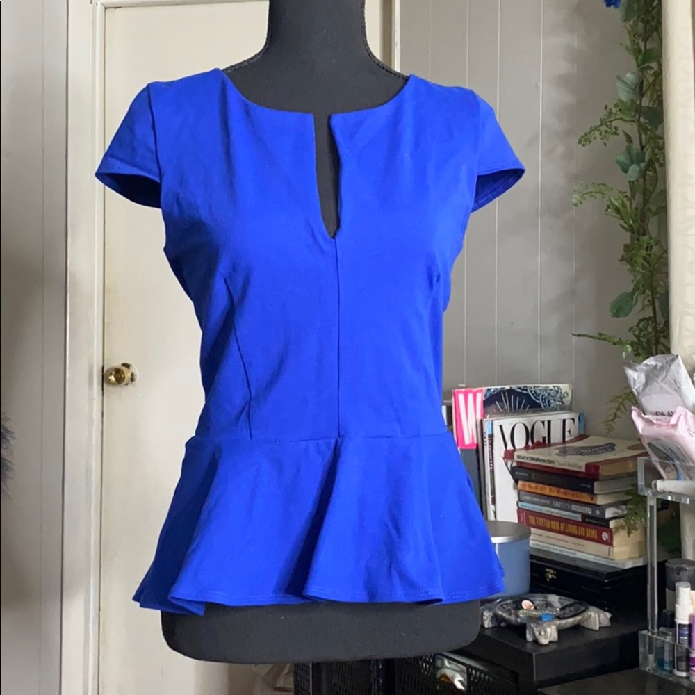 Bebe hi low peplum deep v top